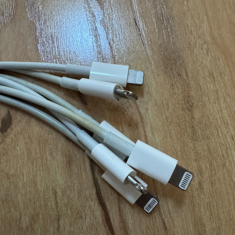 8 (eight) for all of them - Apple - 3.3' (1M) USB-C to Lightning Cable - White